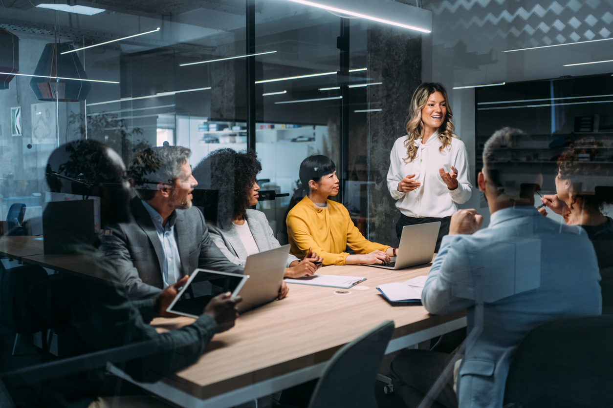 An operations analyst presents some recommendations to an organization’s leadership team.